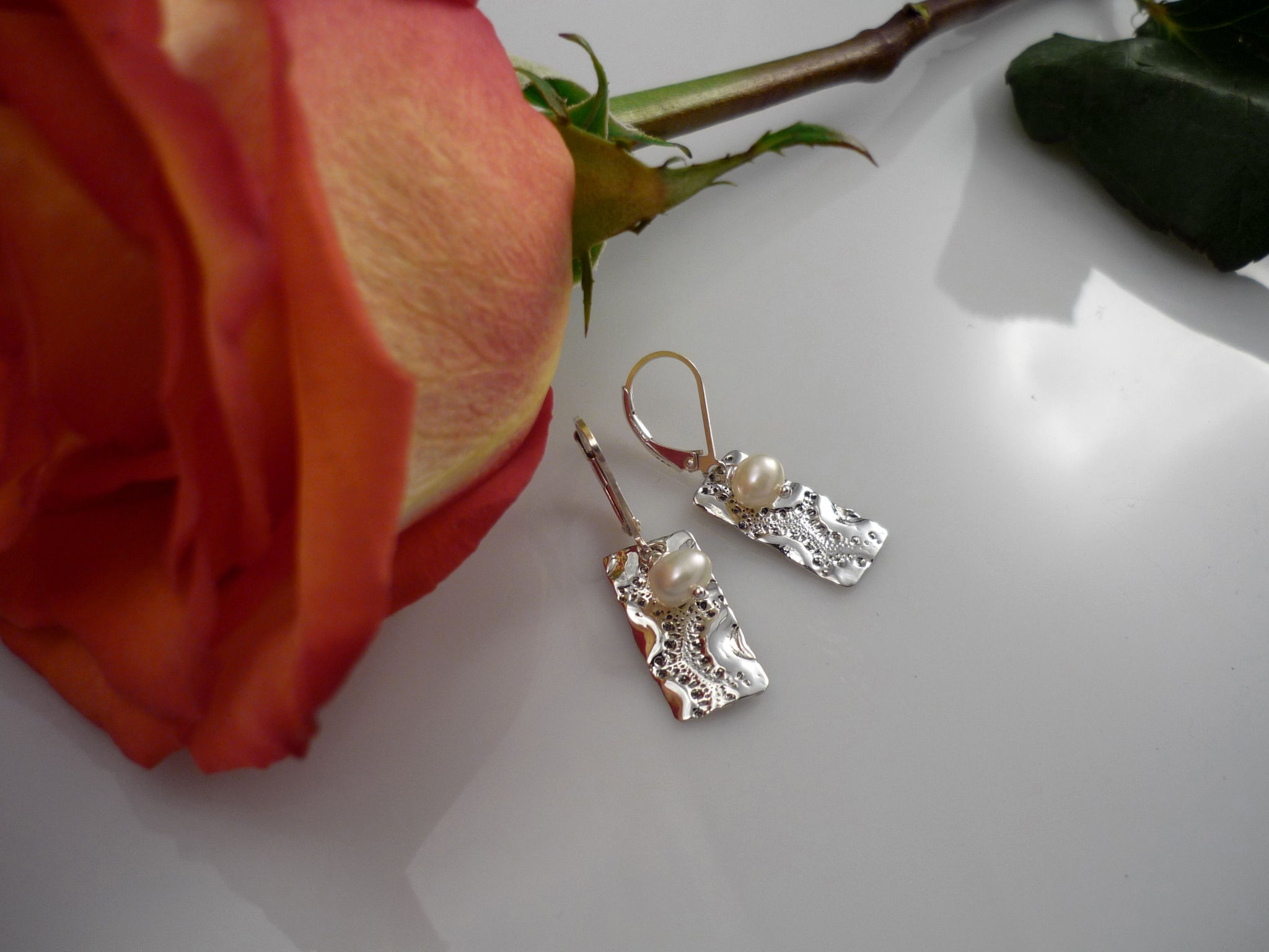 women-silver-dangling-earrings
