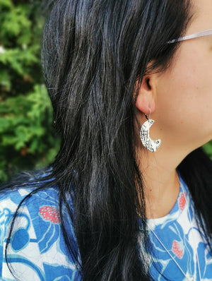 CURIOUS, unique earrings with a texture of cantaloup peel and sea urchin shell!