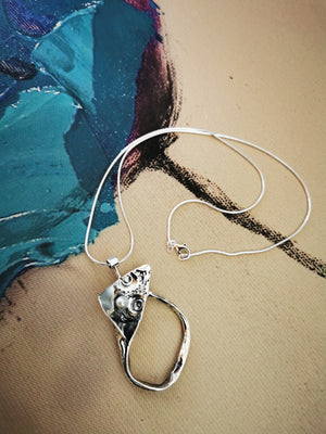 BEYOND THE PEARL STORM, unique sterling silver and freshwater pearl pendant