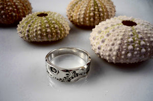 EKHINOS wedding band in sterling silver with a sea urchin shell imprint handcrafted in Canada