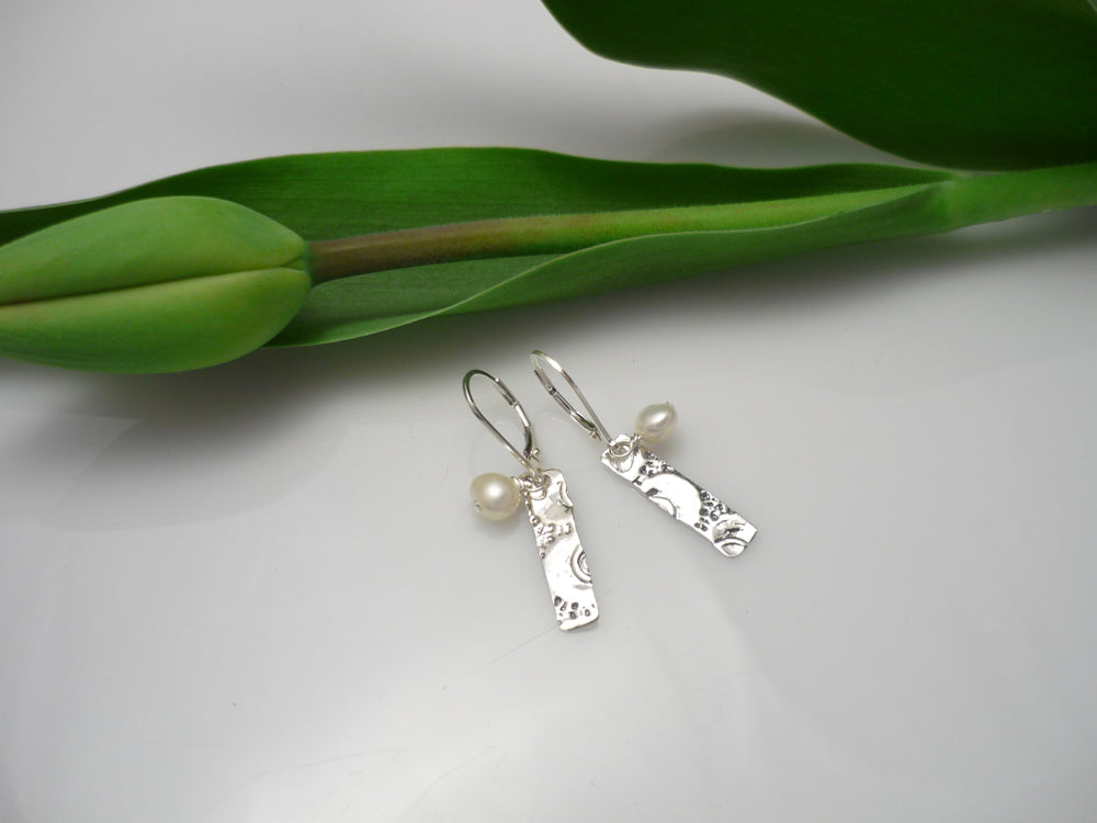 GREAT PEARL DREAMER, sterling silver and pearl earrings with a lace design made from a sea urchin shell casting