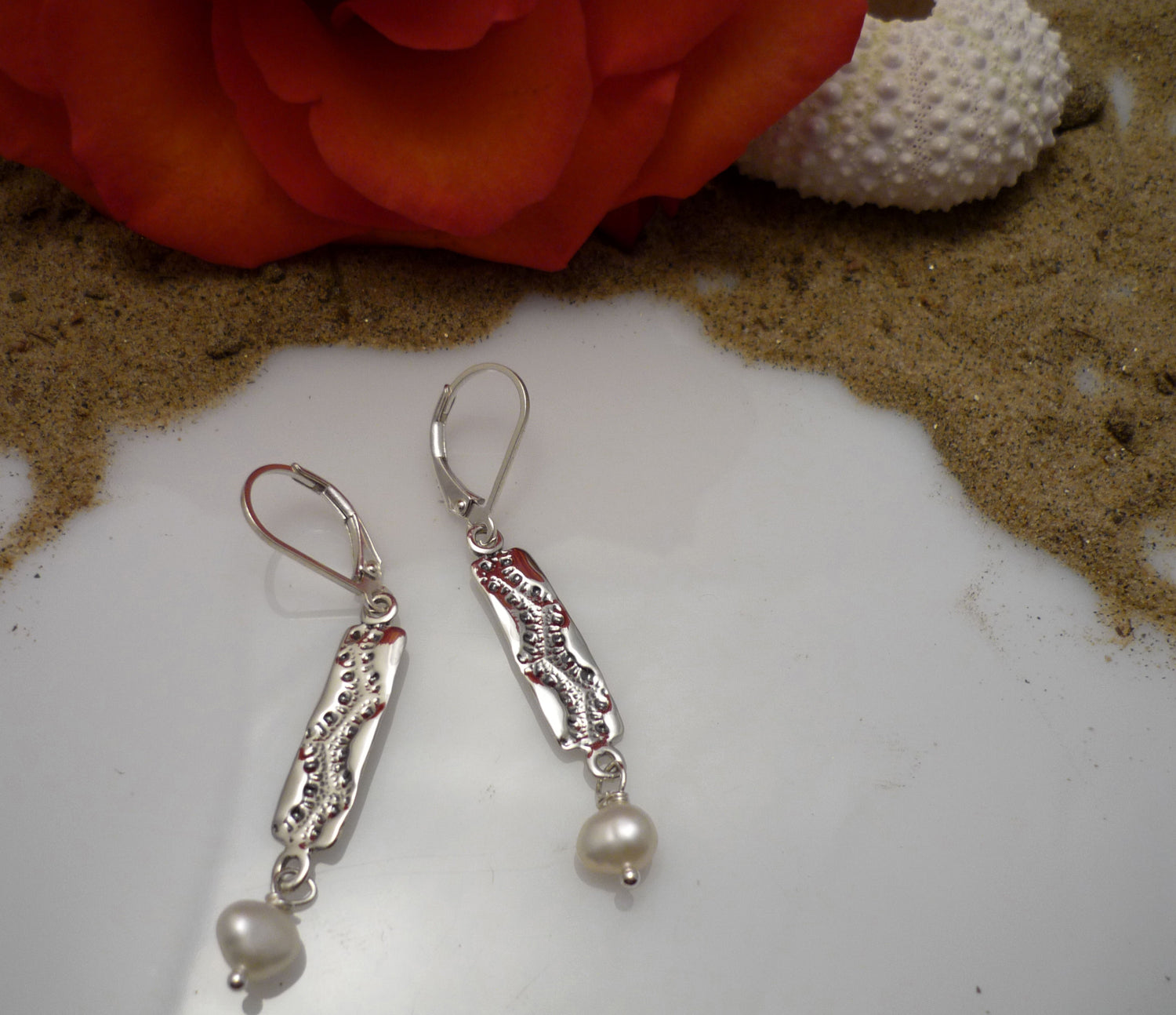 PEARLY LACE, sterling silver and freshwater pearl earrings with a sea urchin shell simprint