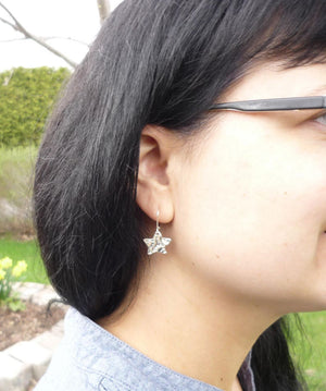TO EACH HIS OWN STAR, star earrings with a sea urchin print