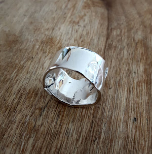 BARISTA RING, wide sterling silver band with coffee bean imprints.