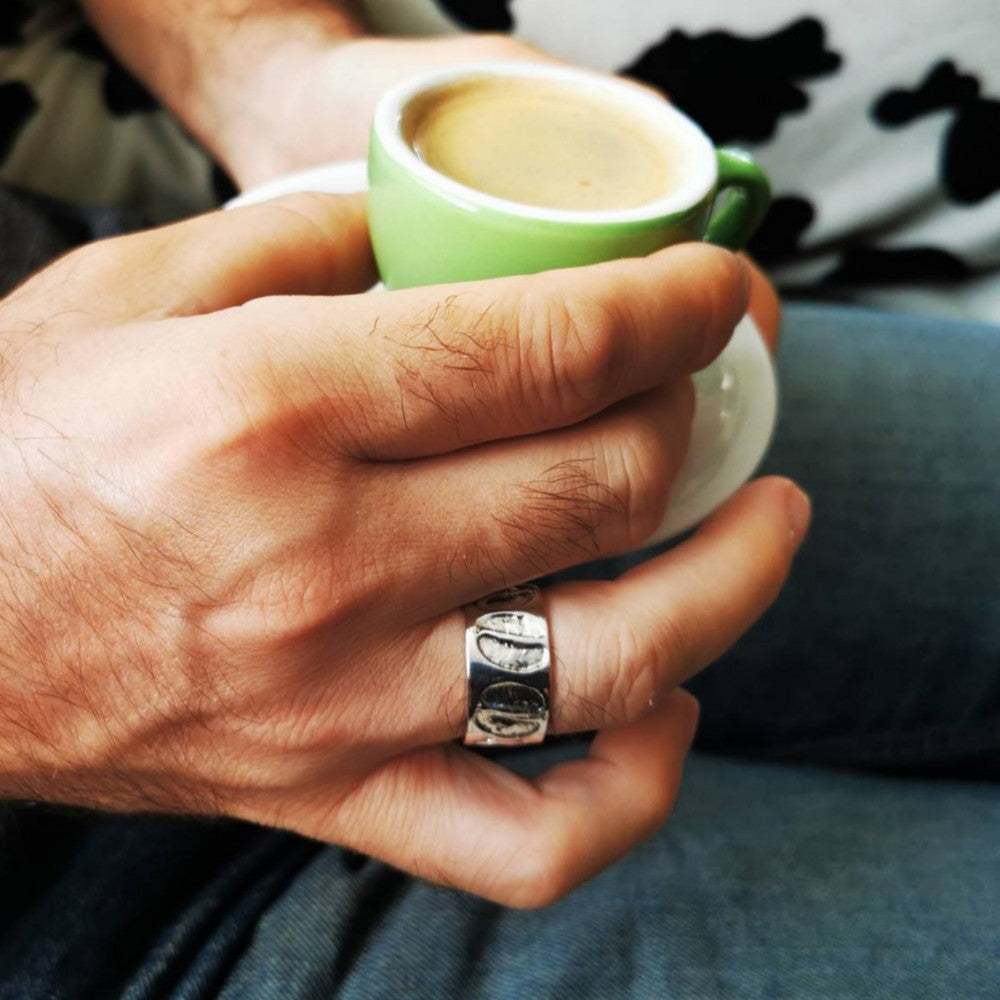 ESPRESSO RING, wide sterling silver ring with coffee bean imprints.