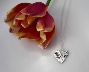 MEDIUM HEART, sterling silver pendant with a sea urchin shell imprint.